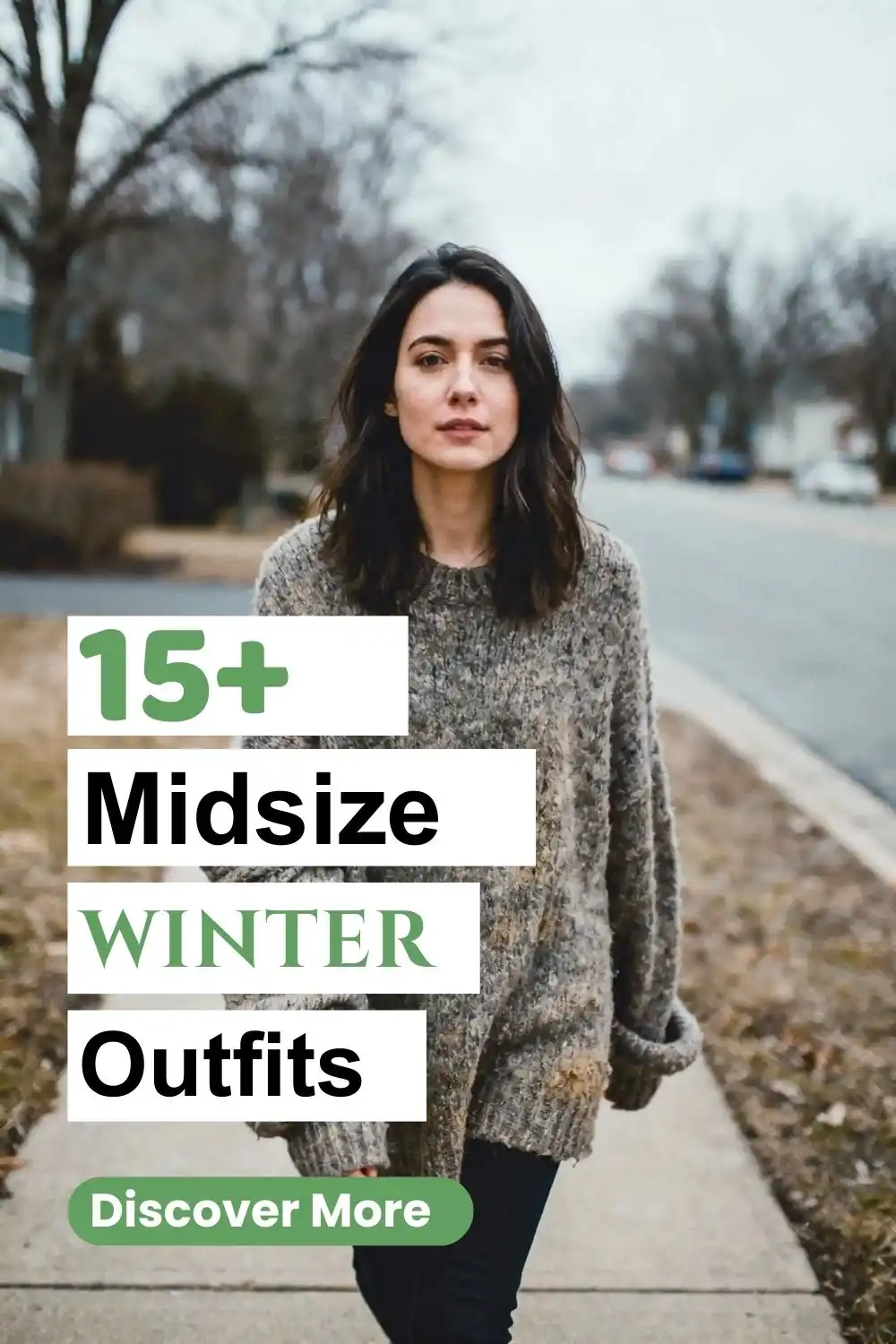 Woman walking on a quiet street wearing a cozy midsize winter outfit with an oversized knit sweater and dark leggings, styled casually for cold weather.