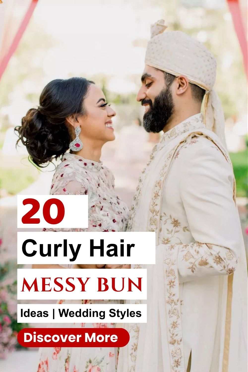 Bride with curly hair messy bun styled low at the nape, soft curls, and elegant wedding attire beside groom.